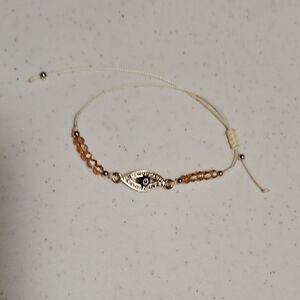 White String Bracelet with Eye-Shaped Evil Eye Charm